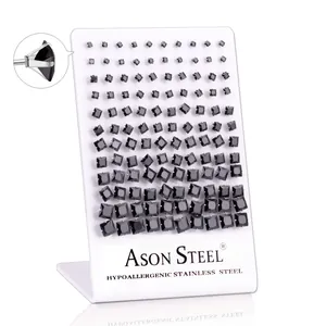 Macro detail of hypoallergenic stainless steel earrings with black square-cut zircons