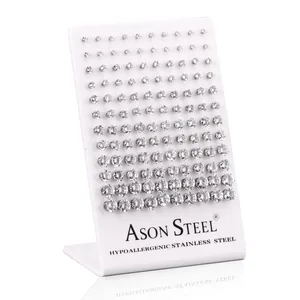 Detailed set of hypoallergenic stainless steel stud earrings with clear round crystals