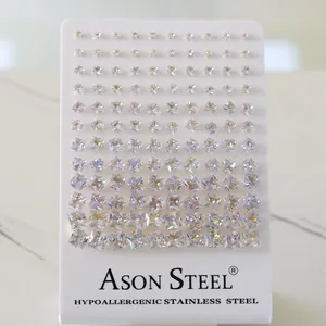 Macro detail of hypoallergenic stainless steel CZ stud earring set on display card