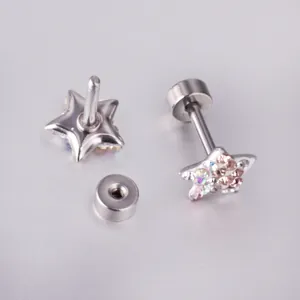 Detailed macro view of star-shaped rhinestone stud earrings with screw-back closures