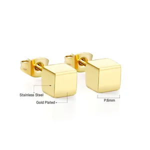 Close-up of 6mm gold plated stainless steel cube stud earrings with butterfly back