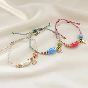 Bohemian fish ceramic bead and shell charm woven bracelets in pastel colors