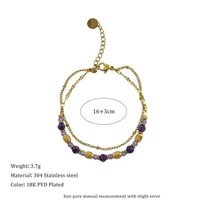 Detail view of double-layer stainless steel gold bracelet with purple chalcedony beads
