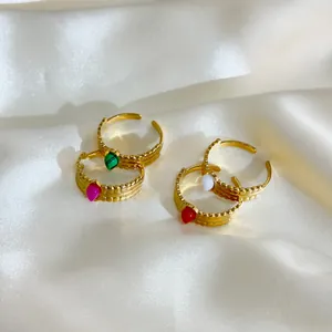 Set of four 18K gold plated stainless steel rings with colorful teardrop stones