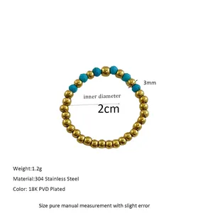Detail of 18K PVD gold beaded ring with natural blue stone and 3mm stainless steel beads