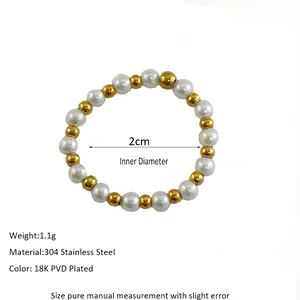 Detail of 2cm beaded ring with white pearls, 18K gold-plated beads, and 304 stainless steel