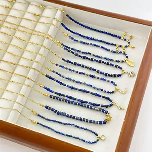 Handmade gold plated necklace set with lapis lazuli beads and celestial pendants