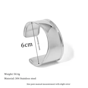 Detail showing 6cm inner diameter of the polished 304 stainless steel wavy bangle
