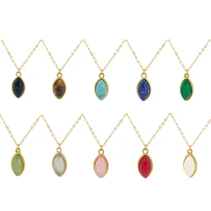 Close-up of colorful marquise stone pendants on golden chains in ten vivid colors