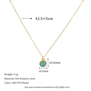 Close-up of 18K gold plated stainless steel necklace with round turquoise stone pendant