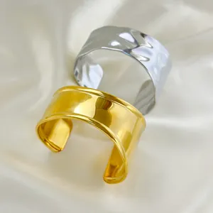Polished 18K gold and silver plated stainless steel wave bangles with hammered texture