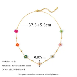 Detail of 18K PVD gold plated stainless steel chain with colorful floral bead charms