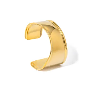 Polished 18K gold plated stainless steel wave bangle with minimalist C-shaped open design