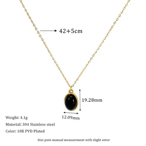 Detail of oval black stone pendant with 18K gold plated stainless steel O-chain