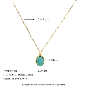 Detailed view of oval turquoise pendant on 18K PVD gold plated stainless steel necklace