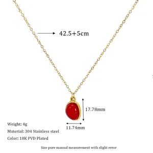 Detail showing 18K gold plated stainless steel necklace chain and red gemstone pendant size
