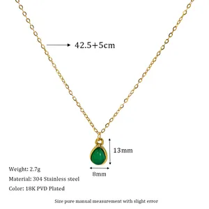 Detail view of gold PVD plated 304 stainless steel necklace with green teardrop stone