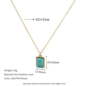Detail of square turquoise stone pendant on 18K gold plated stainless steel chain