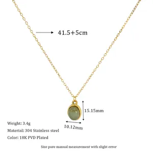 Detailed view of 18K gold plated stainless steel necklace with green oval stone pendant