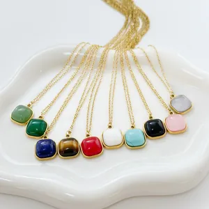 Detail of square natural stone pendants in various colors with 18k gold plated chains