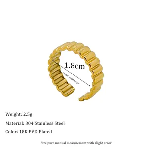 Detail showing 18K PVD gold plated wavy stainless steel ring with 1.8cm inner diameter