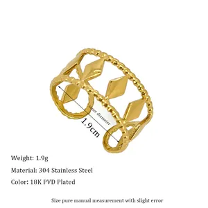 Macro detail of geometric hollow ring in 18K PVD gold plating with beaded edge design