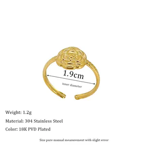 Macro shot of 18K PVD gold plated 304 stainless steel ring with floral engravings