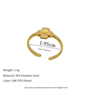 Detail of 18K PVD gold plated stainless steel clover ring with dimensions and 1.4g weight