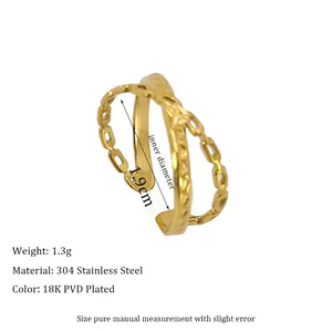 Detail of 18K PVD gold plated 304 stainless steel cross ring showing 1.9cm inner diameter