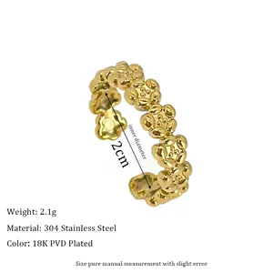 Detail view of 18K PVD gold plated 304 stainless steel flower ring with 2cm inner diameter