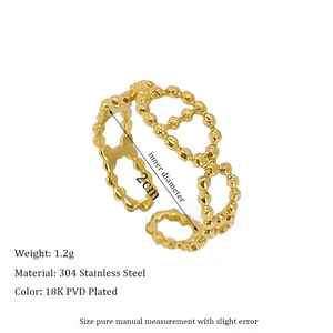 Detailed macro view of 18K PVD gold plated 304 stainless steel hollow beaded ring