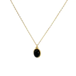 Gold stainless steel necklace with a classic oval black natural stone pendant centerpiece