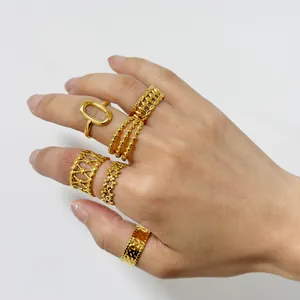 Detailed close-up of a 6-piece gold-plated stainless steel stackable ring set for women