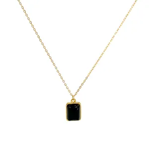 French minimalist 18K gold chain necklace featuring a square black natural stone pendant