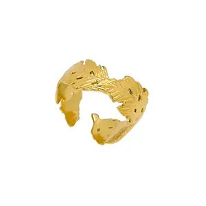 Adjustable golden leaf open ring with hollow texture in polished stainless steel