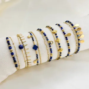 Böhmisches vergoldetes Edelstahl-Armband-Set mit blauen Lapisperlen und Sternanhängern