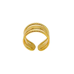 Eleganter goldener Schichtring mit gedrehten Seilrändern und polierter Mitte für Damen
