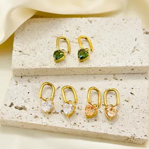 Three pairs of elegant heart-shaped zircon drop earrings in gold finish and diverse colors