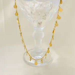 Elegant gold-plated stainless steel necklace with polished round disc pendants