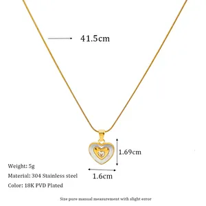 Macro detail of gold-plated heart pendant with dimensions and 304 stainless steel specs