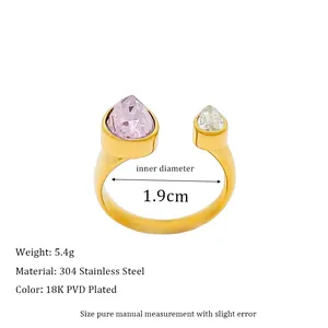 Detail view of 18K gold plated stainless steel ring with pink and white teardrop stones