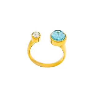 Bague vintage en acier titane doré avec cristal bleu et incrustation de zircon