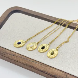Colliers vintage français en acier inoxydable doré avec pendentifs ovales et pierres fines
