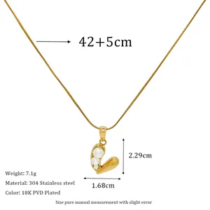Detail showing 18k gold heart pendant with three pearls on a sleek 42cm snake chain