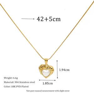 Detail view of heart pearl pendant on snake chain with size and 304 material specs