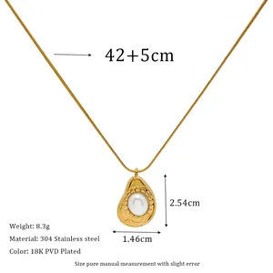 Detail view of 18K gold plated stainless steel snake chain with a white pearl heart pendant