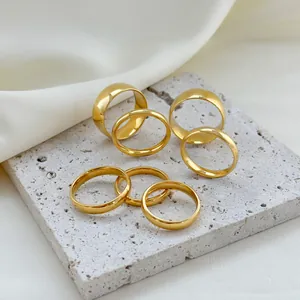 Set of 7 minimalist 18k gold plated titanium steel rings with polished finish