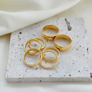 Minimalist 18k gold plated titanium steel ring set with wide and thin polished bands
