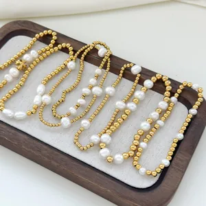 18K gold stainless steel bracelet with freshwater pearls and cross pendant charms