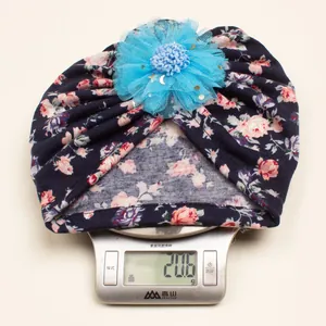 Lightweight baby turban hat with floral print and mesh flower weighing 20.6g